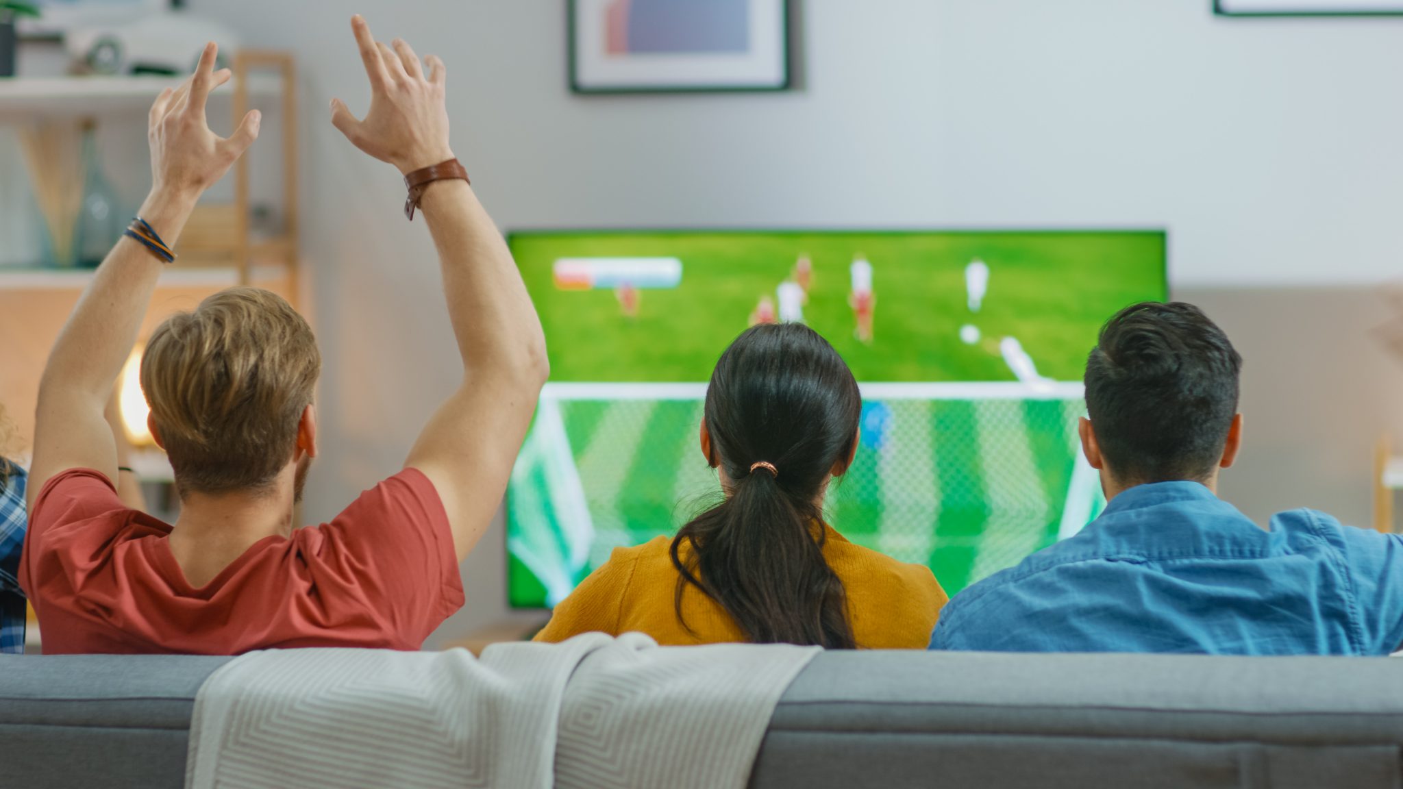 Watching sporting events on tv is. Watching sporting events on tv is. Watching sporting events on tv is. Спорт по телевизору. Group watching football.